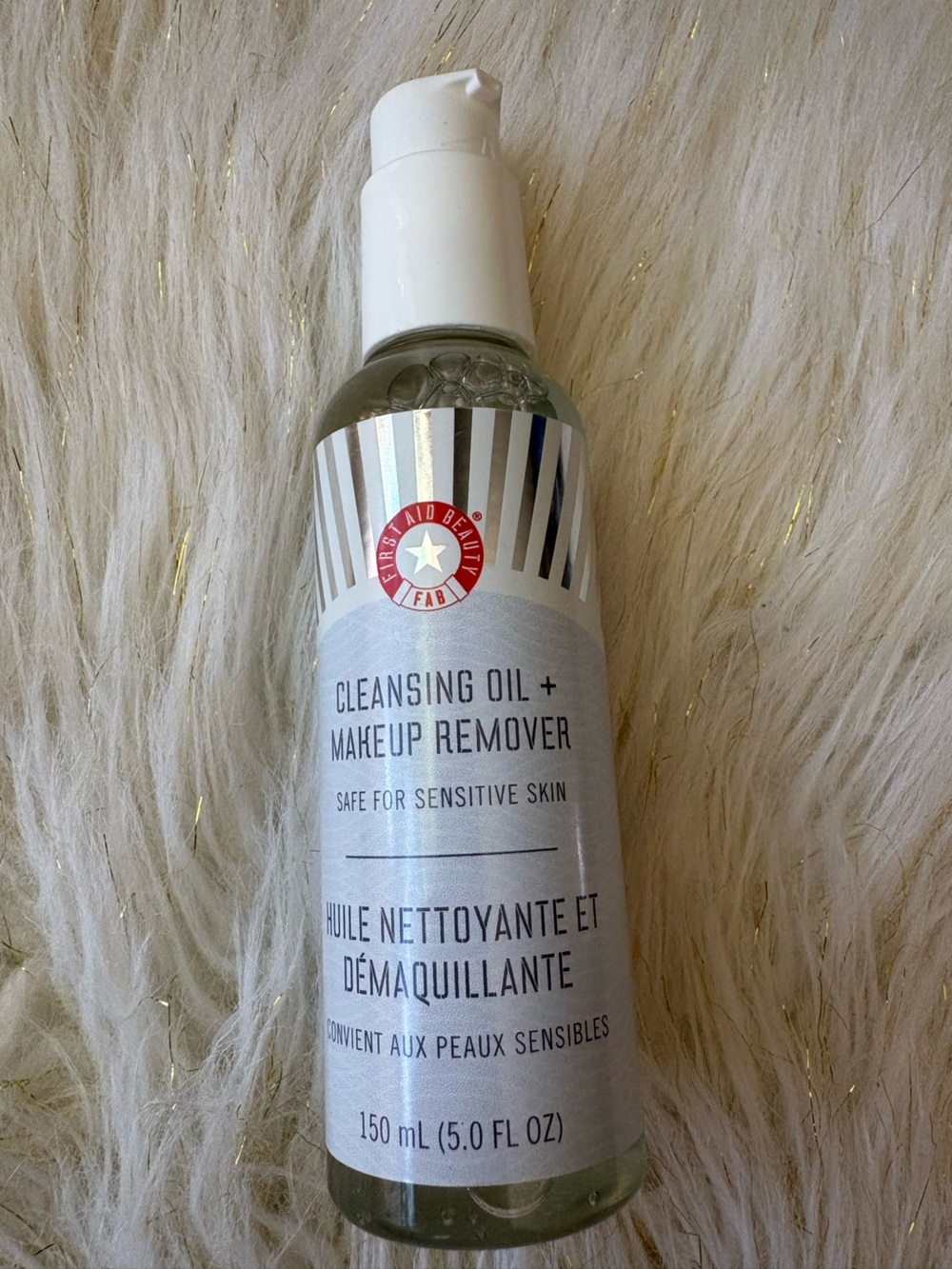 First Aid Beauty Cleansing Oil + Makeup Remover - White and Silver Bottle